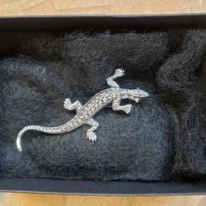 Costume jewellery silver tone lizard.